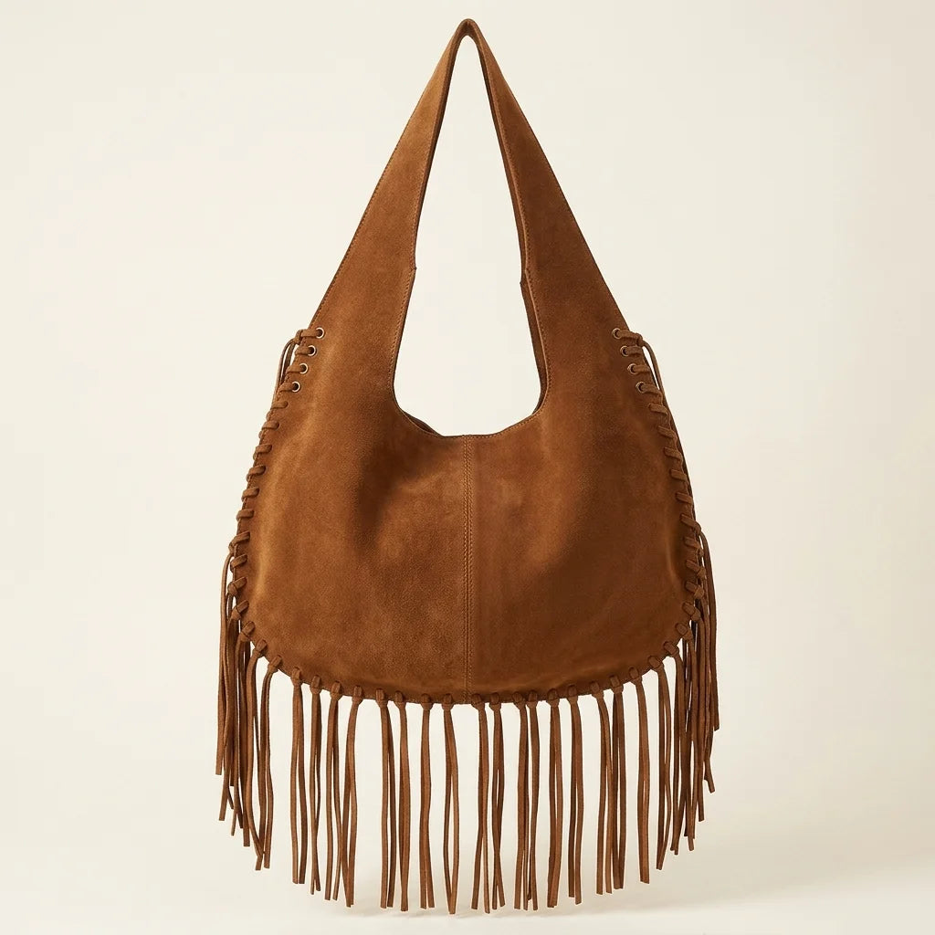 Back panel of Brown bag with fringe tassel with strap attachments