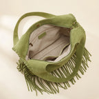 Interior lining and pockets of Green bag with fringe tassel