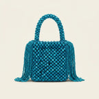 Back panel of Blue beaded fringe clutch bag with strap attachments