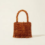 Back panel of Brown beaded fringe clutch bag with strap attachments