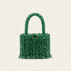 Back panel of Green beaded fringe clutch bag with strap attachments