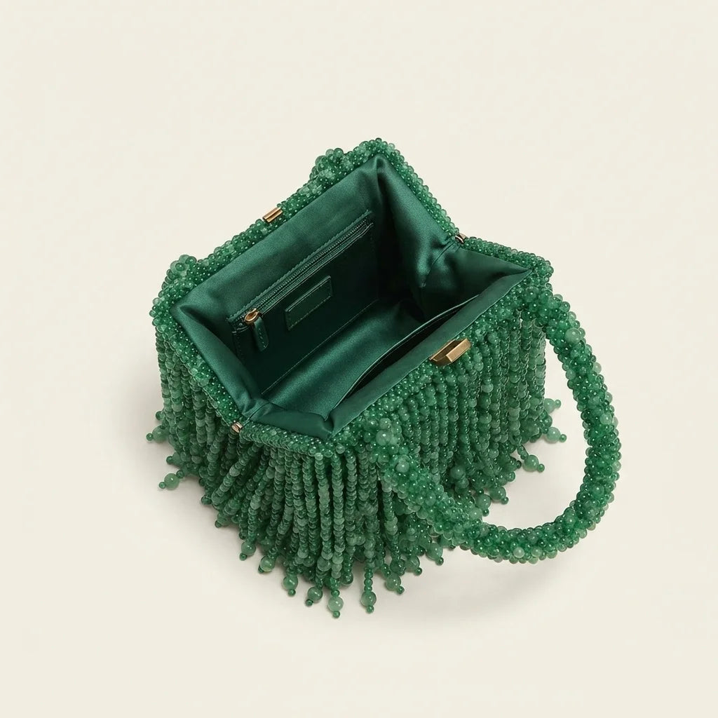 Interior lining and pockets of Green beaded fringe clutch bag