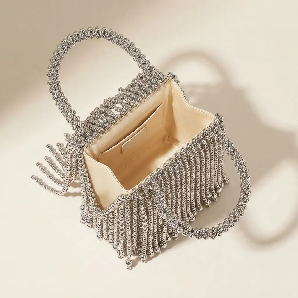 Interior lining and pockets of Silver Grey beaded fringe clutch bag