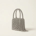Silver Grey beaded fringe clutch bag, three-quarter angle showing side depth