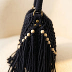 Close-up of fringe stitching and texture on Black beaded fringe shoulder bag