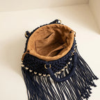 Interior lining and pockets of Black beaded fringe shoulder bag