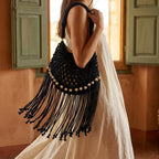 Woman wearing Black beaded fringe shoulder bag with swaying fringe