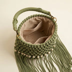 Interior lining and pockets of Green beaded fringe shoulder bag