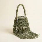 Green beaded fringe shoulder bag, three-quarter angle showing side depth