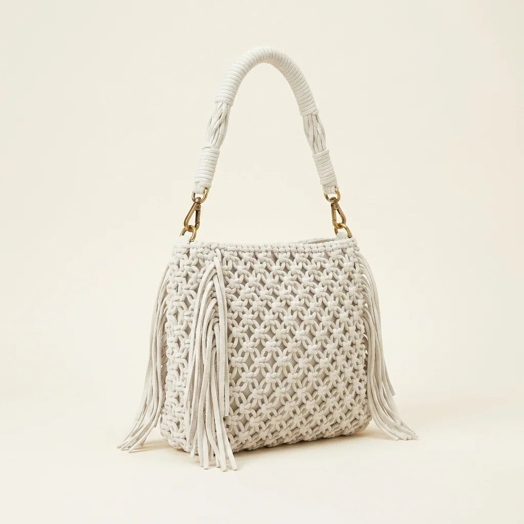 White beaded fringe shoulder bag, three-quarter angle showing side depth
