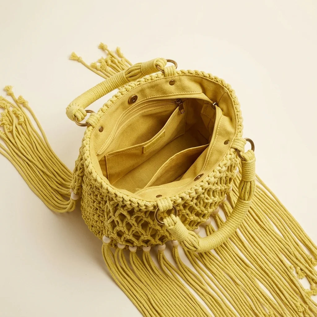 Interior lining and pockets of Yellow beaded fringe shoulder bag