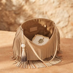 Interior lining and pockets of Beige beige fringe bag
