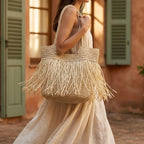 Woman wearing Beige beige fringe tote bag with swaying fringe