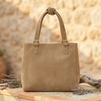 Back panel of Khaki big fringed shoulder bag with strap attachments