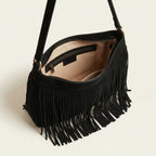Interior lining and pockets of Black black fringe bag suede