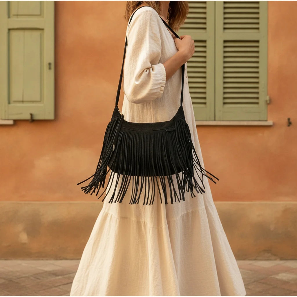 Woman wearing Black black fringe bag suede with swaying fringe