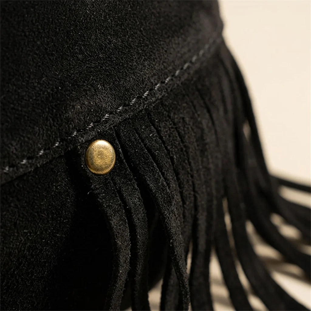 Close-up of fringe stitching and texture on Black black fringe belt bag