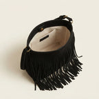 Interior lining and pockets of Black black fringe bucket bag