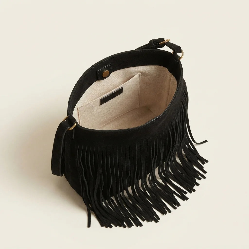 Interior lining and pockets of Black black fringe bucket bag