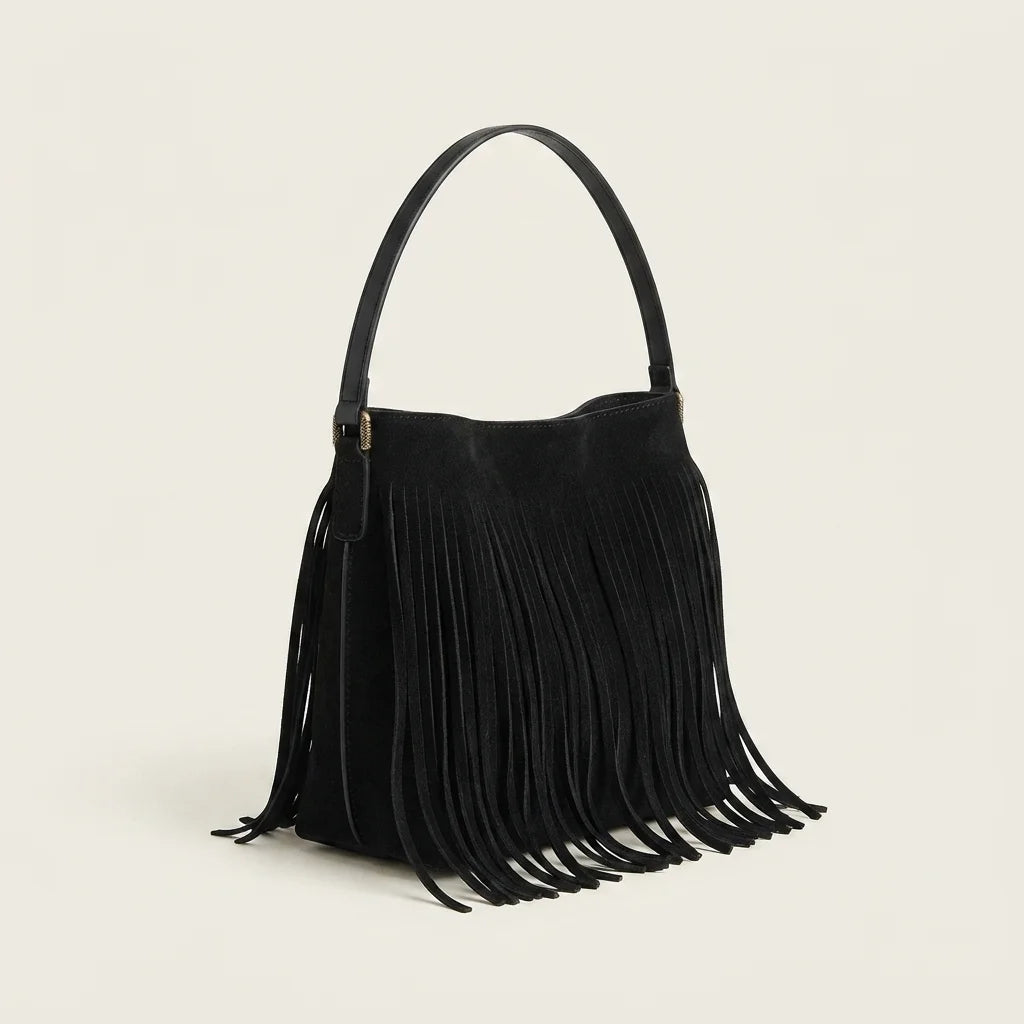 Black black fringe bucket bag, three-quarter angle showing side depth