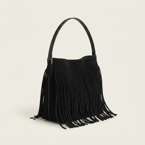 Black black fringe bucket bag, three-quarter angle showing side depth