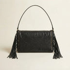 Black black fringe clutch bag, front view