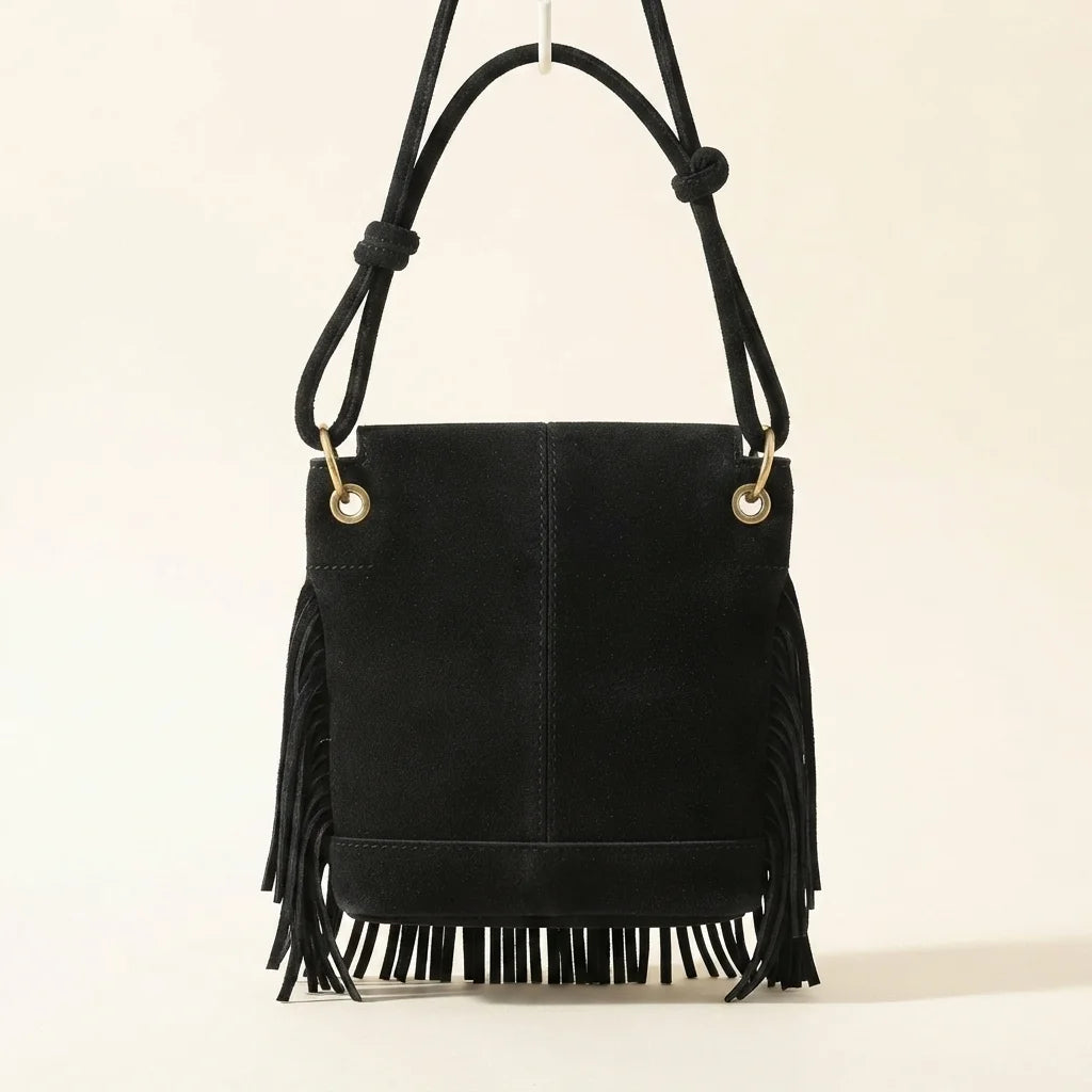 Back panel of Black black fringe messenger bag with strap attachments
