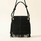 Back panel of Black black fringe messenger bag with strap attachments