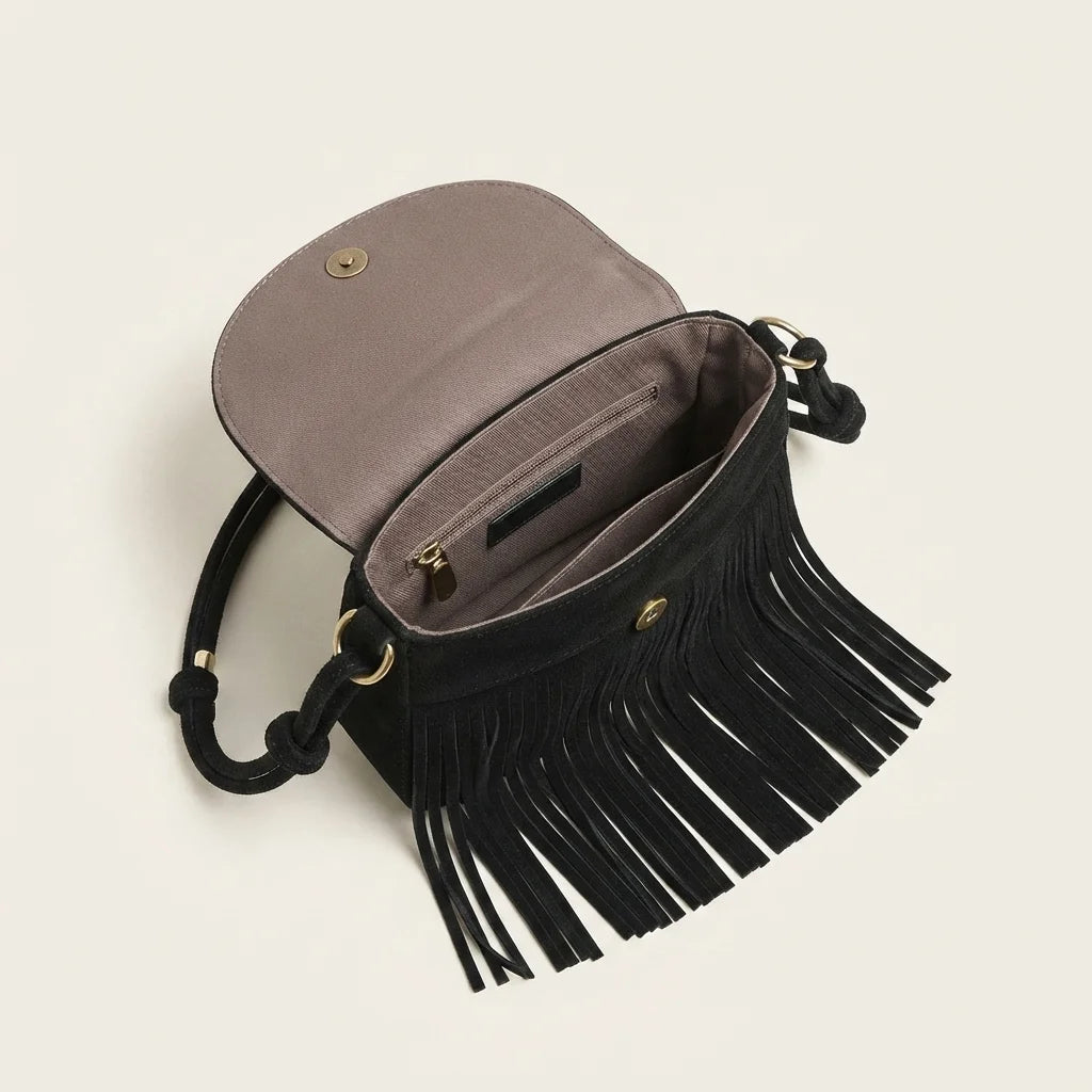 Interior lining and pockets of Black black fringe messenger bag