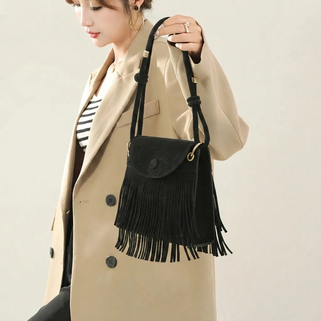 Black black fringe messenger bag, three-quarter angle showing side depth