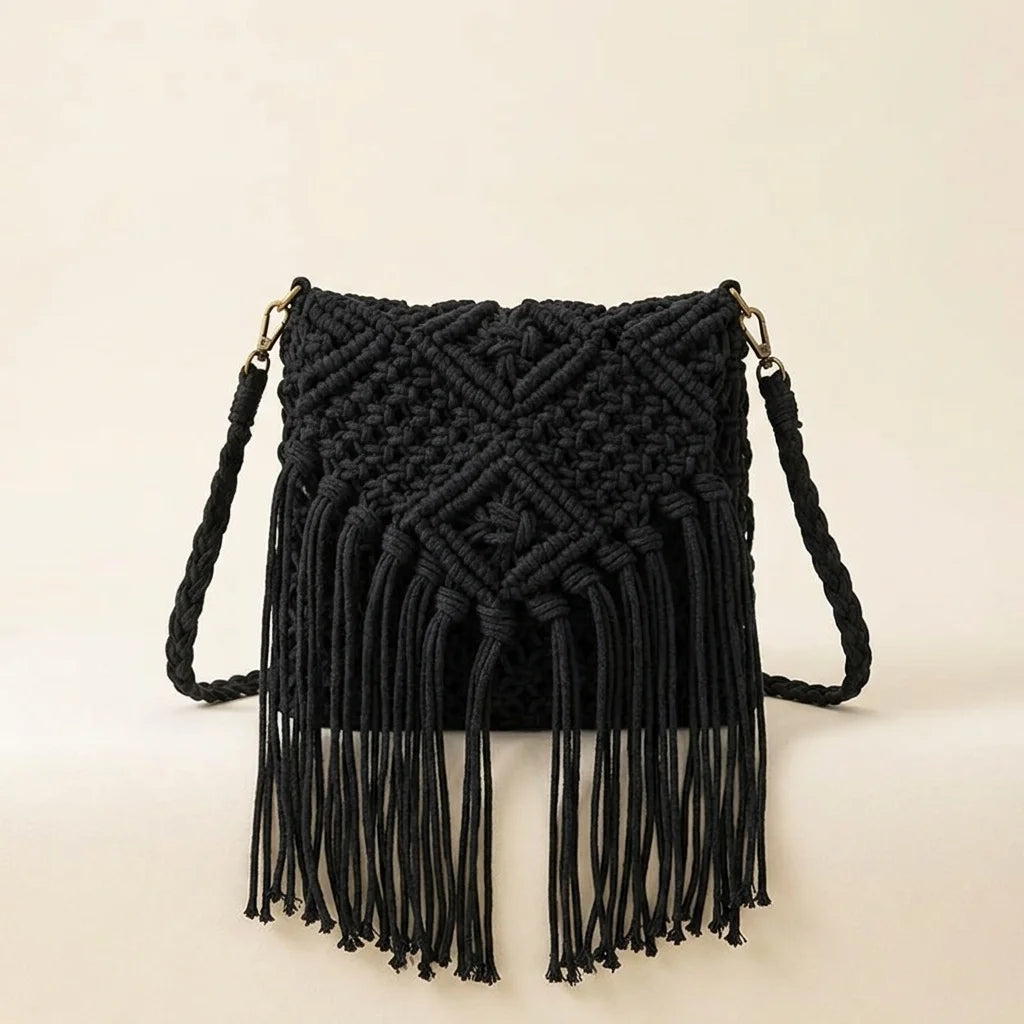 Back panel of Black black fringe over the shoulder bag with strap attachments
