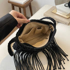 Interior lining and pockets of Black black fringe over the shoulder bag