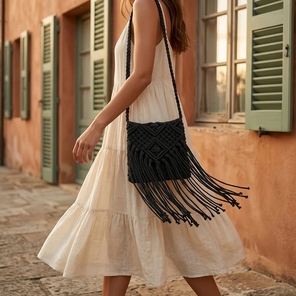 Woman wearing Black black fringe over the shoulder bag with swaying fringe