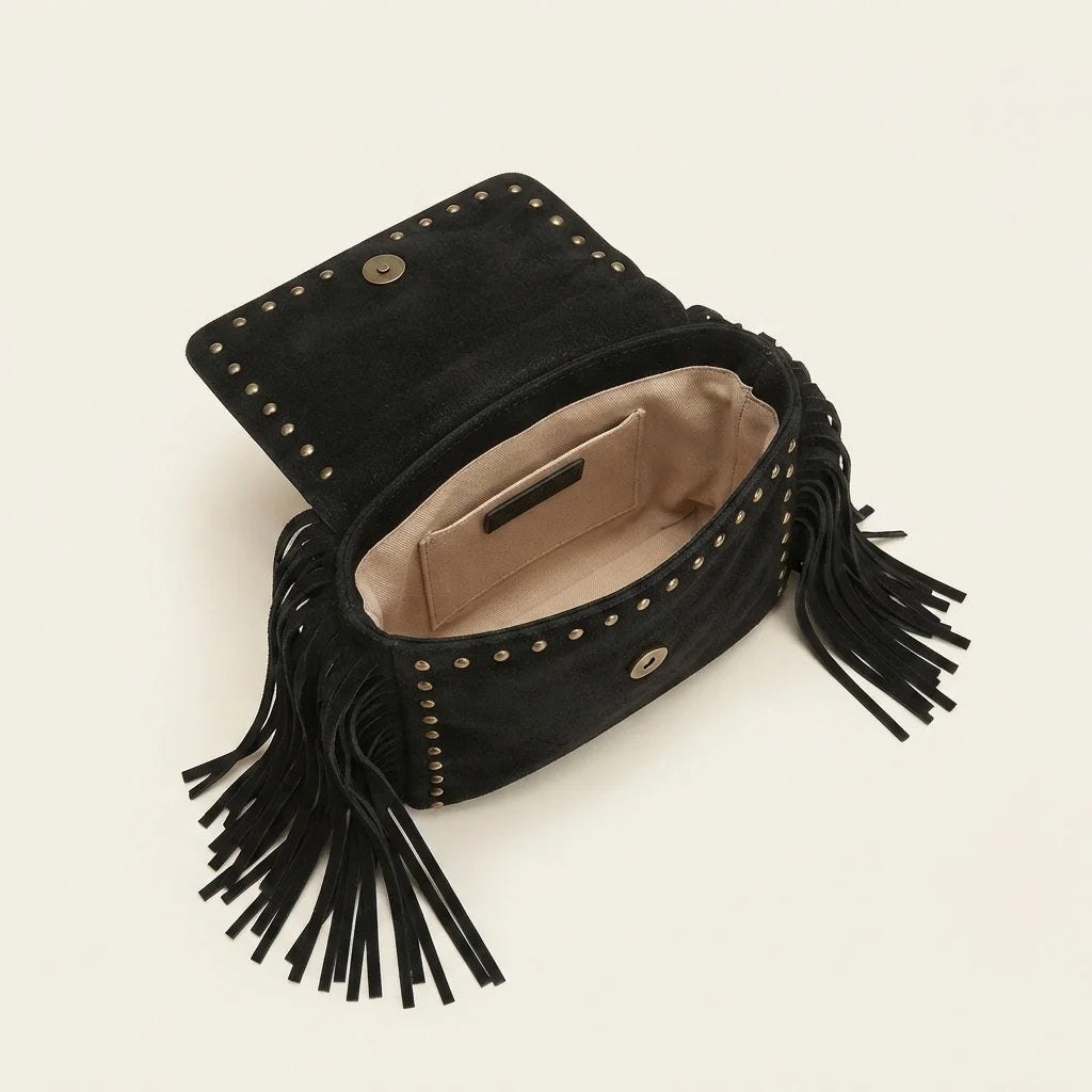 Interior lining and pockets of Black black fringe tassel across body bag