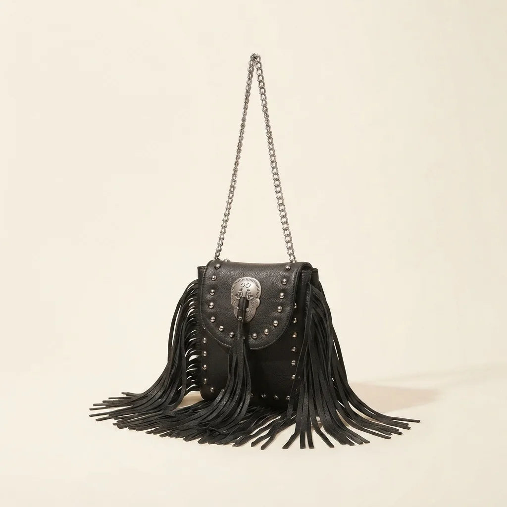 Black black fringe tassel across body bag, three-quarter angle showing side depth