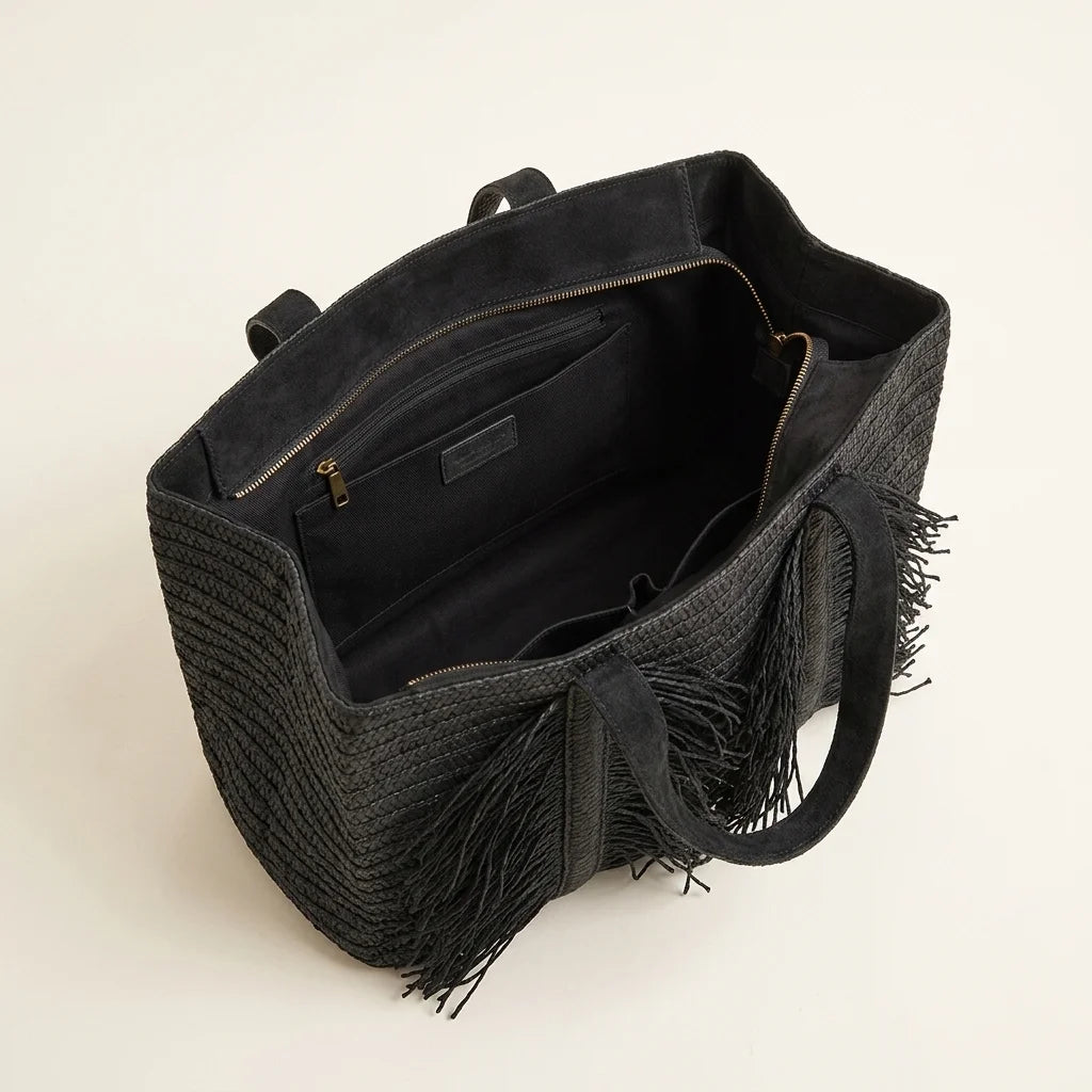 Interior lining and pockets of Black black fringe tote bag