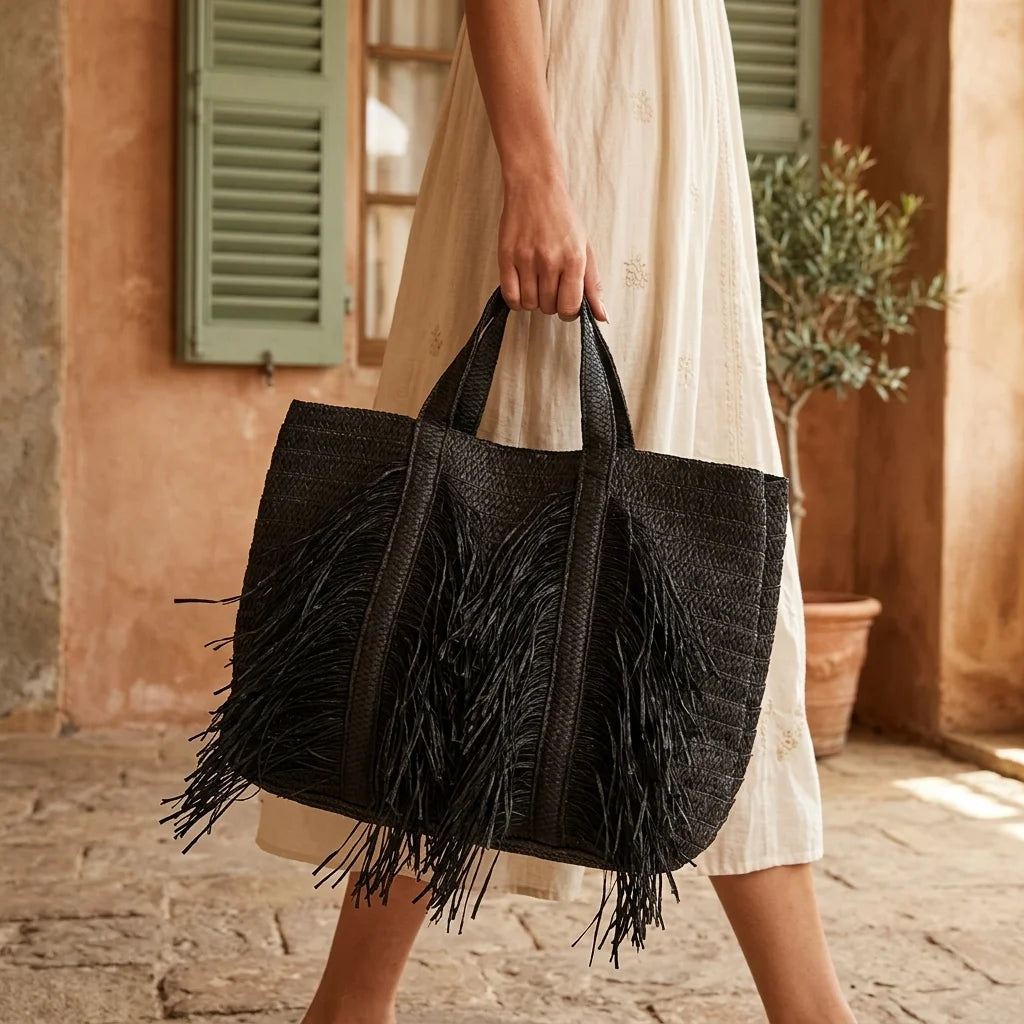 Woman wearing Black black fringe tote bag with swaying fringe