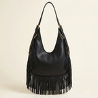 Back panel of Black black leather fringe bag with strap attachments