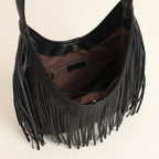 Interior lining and pockets of Black black leather fringe bag