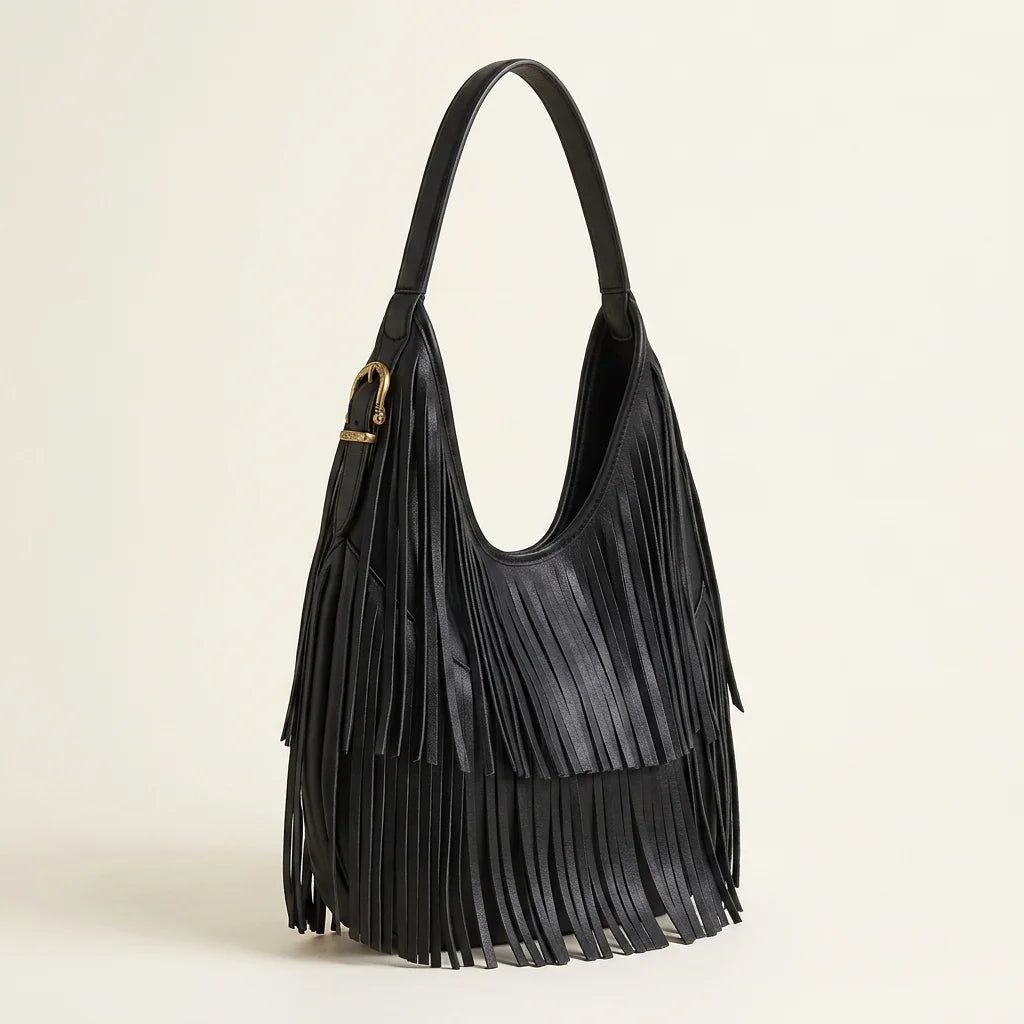 Black black leather fringe bag, three-quarter angle showing side depth