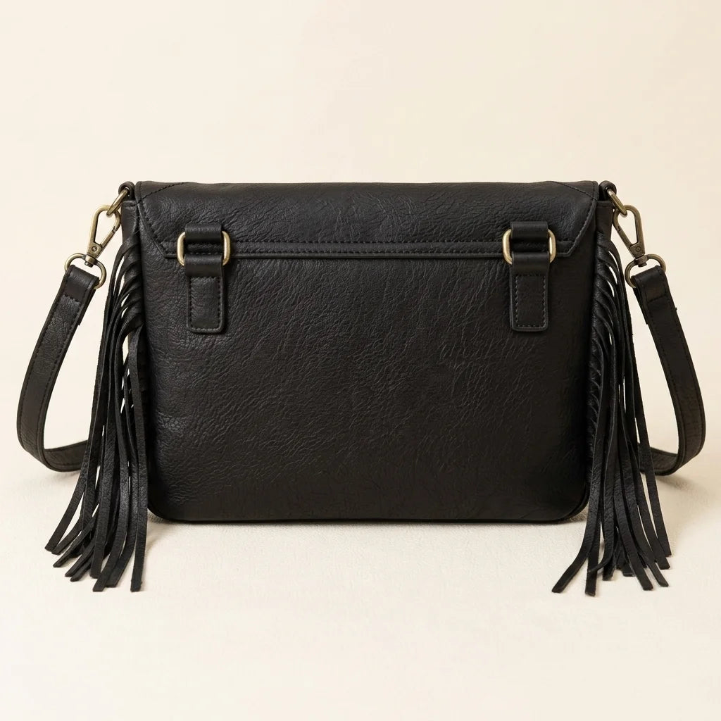 Back panel of Black black leather fringe crossbody bag with strap attachments