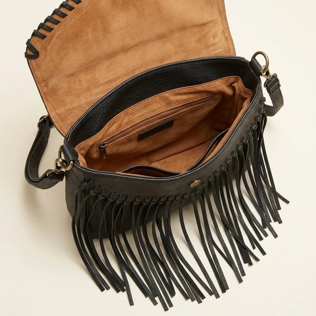 Interior lining and pockets of Black black leather fringe crossbody bag