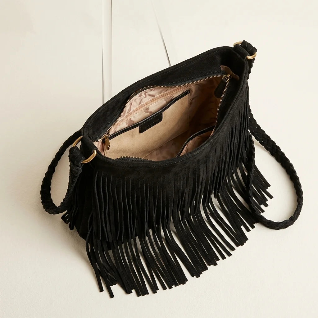 Interior lining and pockets of Black black suede fringe crossbody bag
