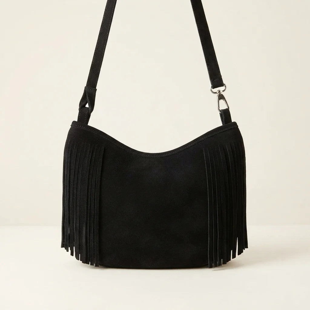 Back panel of Black black suede fringe hobo bag with strap attachments