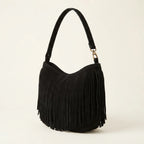 Black black suede fringe hobo bag, three-quarter angle showing side depth