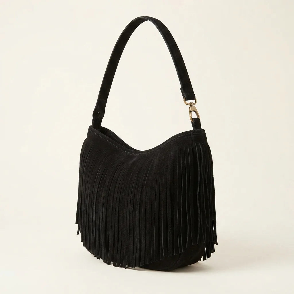Black black suede fringe hobo bag, three-quarter angle showing side depth
