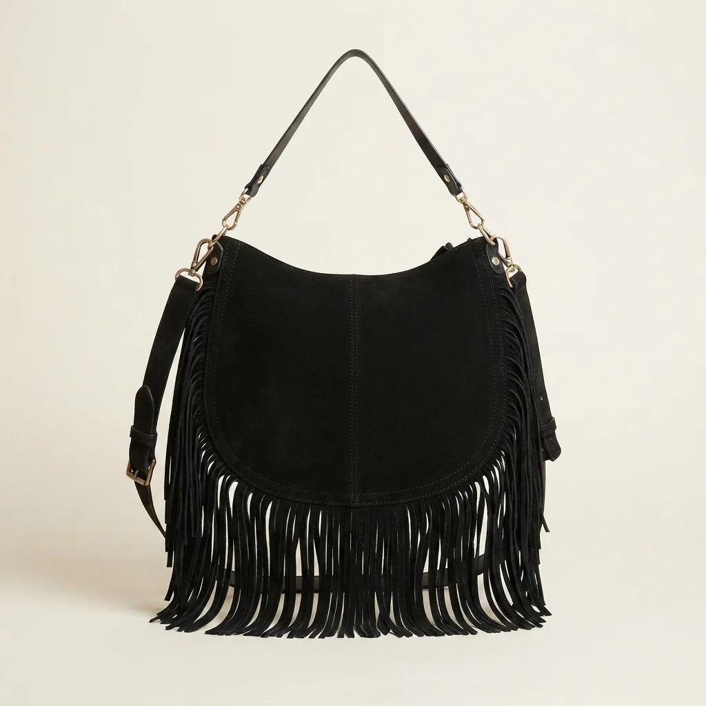 Back panel of Black bohemian fringe bag with strap attachments