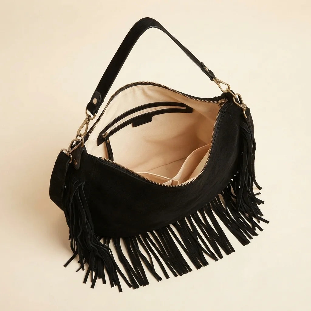 Interior lining and pockets of Black bohemian fringe bag