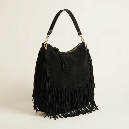 Black bohemian fringe bag, three-quarter angle showing side depth