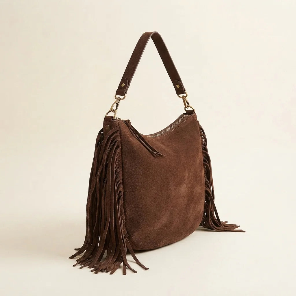 Chocolate bohemian fringe bag, three-quarter angle showing side depth